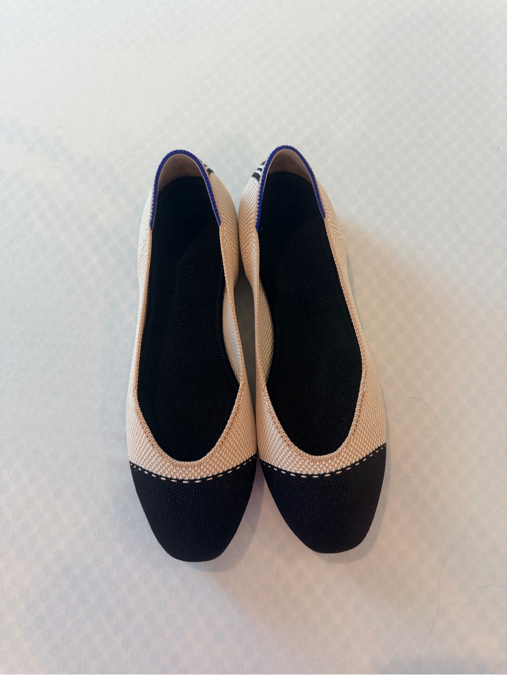 Rothy's Two-Tone Cream and Black Knit Ballet Flats